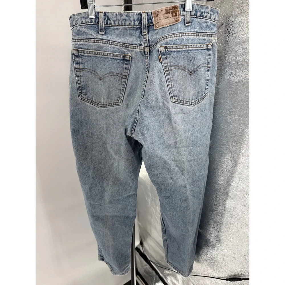 Vintage Levis 550 Orange Tab Relaxed Fit Tapered Leg Light Wash Jeans 34 Waist